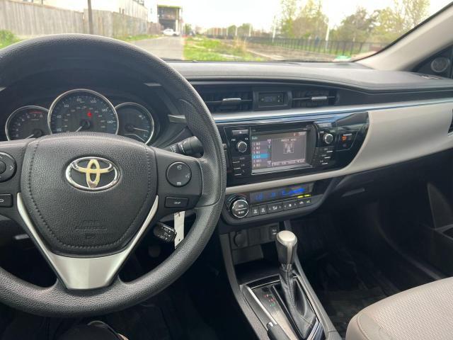 Photo 9 from auction – 2014 TOYOTA COROLLA L with VIN 5YFBURHE8EP087032