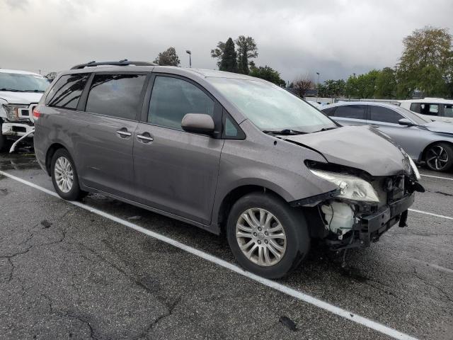 Photo 4 from auction – 2013 TOYOTA SIENNA XLE with VIN 5TDYK3DC9DS394247