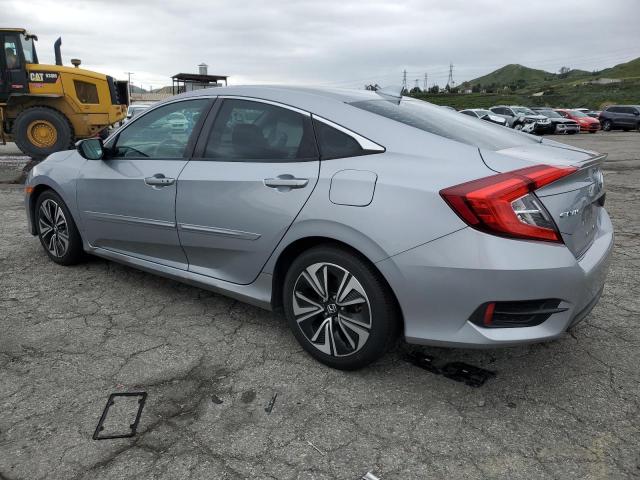 Photo 2 from auction – 2016 HONDA CIVIC EX with VIN 2HGFC1F33GH648691