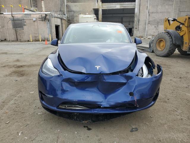 Photo 5 from auction – 2023 TESLA MODEL Y with VIN 7SAYGDEE7PF659900