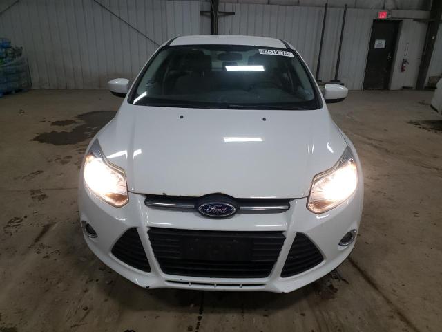 Photo 5 from auction – 2012 FORD FOCUS SE with VIN 1FAHP3F24CL467570