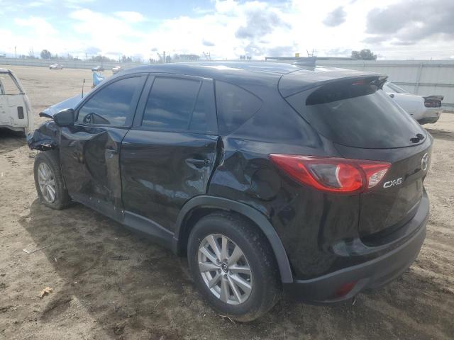 Photo 2 from auction – 2016 MAZDA CX-5 TOURI with VIN JM3KE2CY0G0630559