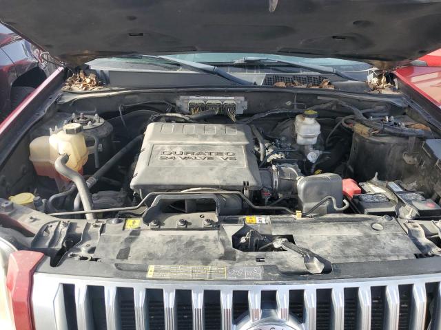 Photo 12 from auction – 2011 MERCURY MARINER PR with VIN 4M2CN8HG1BKJ08885