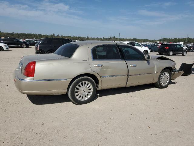 Photo 3 from auction – 2004 LINCOLN TOWN CAR E with VIN 1LNHM81W44Y679847