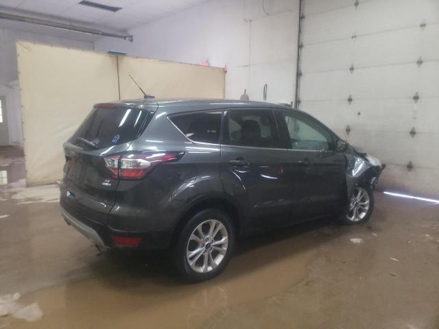 Photo 3 from auction – 2017 FORD ESCAPE SE with VIN 1FMCU9GD5HUD75834