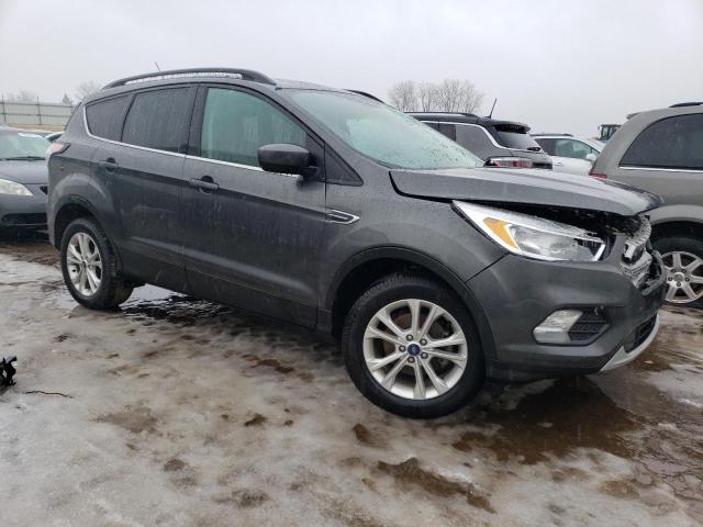 Photo 4 from auction – 2018 FORD ESCAPE SE with VIN 1FMCU0GD4JUD57343
