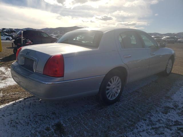 Photo 3 from auction – 2004 LINCOLN TOWN CAR U with VIN 1LNHM83W74Y681850