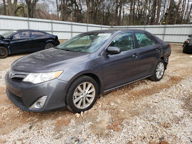 TOYOTA CAMRY L 2014 with VIN 4T1BF1FK7EU398471 - Photo from auction