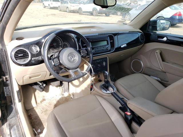 Photo 8 from auction – 2014 VOLKSWAGEN BEETLE with VIN 3VWJ17AT7EM652411