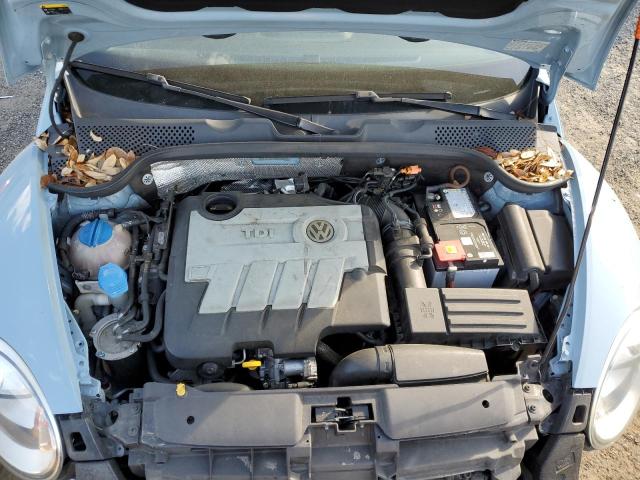 Photo 11 from auction – 2014 VOLKSWAGEN BEETLE with VIN 3VWJL7AT6EM634234