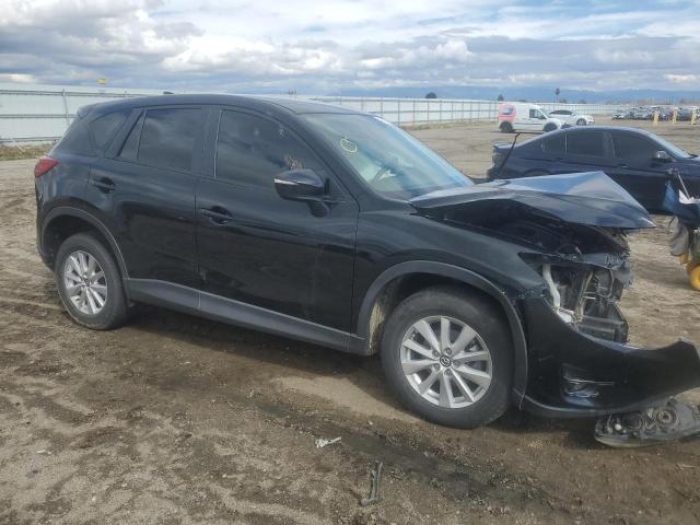 Photo 4 from auction – 2016 MAZDA CX-5 TOURI with VIN JM3KE2CY0G0630559
