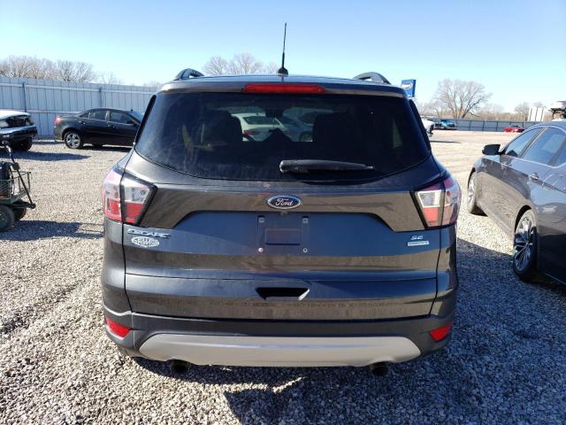 Photo 6 from auction – 2018 FORD ESCAPE SE with VIN 1FMCU0GD3JUD07680