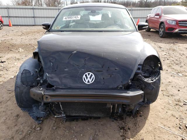 Photo 5 from auction – 2014 VOLKSWAGEN BEETLE with VIN 3VWJ17AT7EM652411