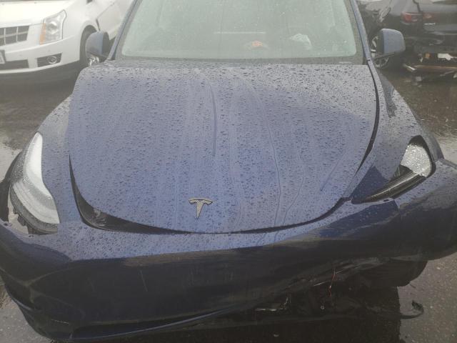 Photo 11 from auction – 2022 TESLA MODEL Y with VIN 7SAYGDEFXNF326645