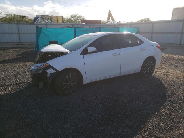 TOYOTA COROLLA L 2018 with VIN 5YFBURHEXJP754256 - Photo from auction