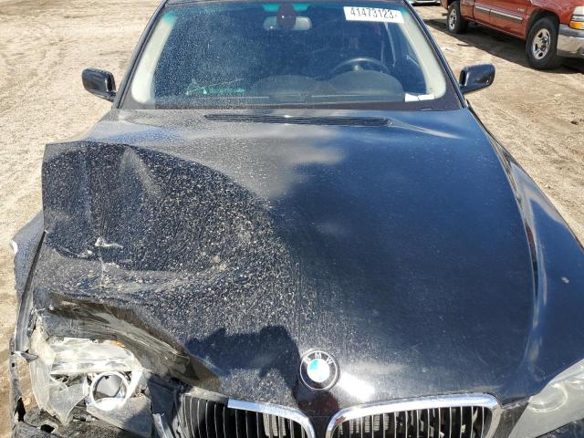 Photo 11 from auction – 2007 BMW 750 with VIN WBAHN83587DT75581