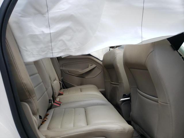 Photo 11 from auction – 2015 FORD ESCAPE TIT with VIN 1FMCU0J97FUA68985