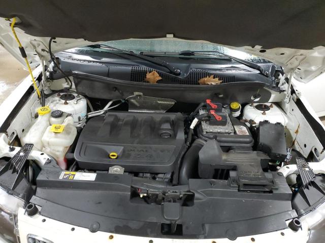 Photo 11 from auction – 2014 JEEP COMPASS LA with VIN 1C4NJDEBXED884047