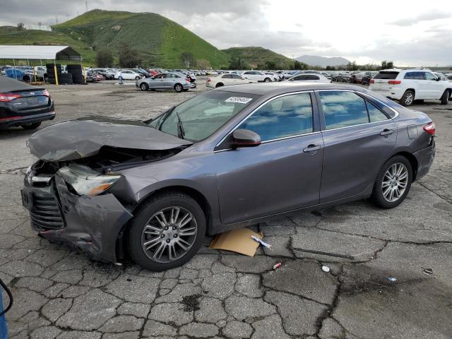 TOYOTA CAMRY LE 2015 with VIN 4T4BF1FK6FR447604 - Photo from auction
