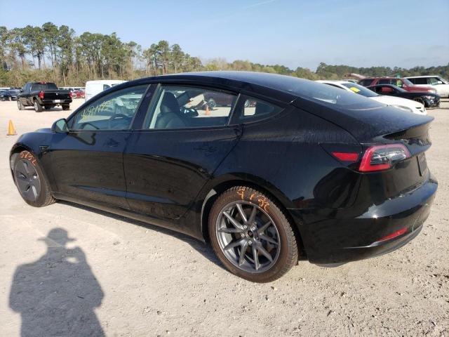 Photo 2 from auction – 2021 TESLA MODEL 3 with VIN 5YJ3E1EB2MF869477