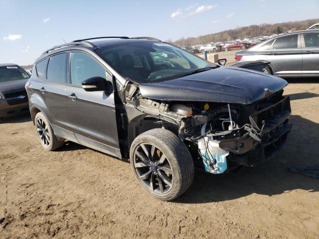 Photo 4 from auction – 2017 FORD ESCAPE TIT with VIN 1FMCU0J90HUB53654