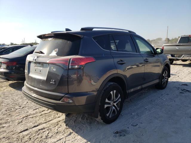 Photo 3 from auction – 2018 TOYOTA RAV4 LE with VIN JTMBFREV5JJ179924