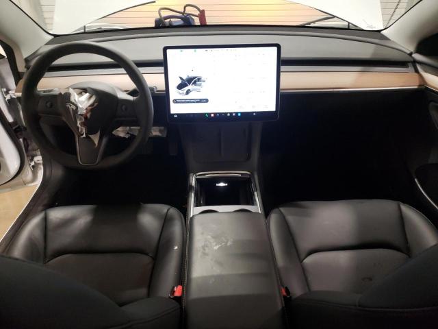 Photo 8 from auction – 2021 TESLA MODEL 3 with VIN 5YJ3E1EA0MF083586
