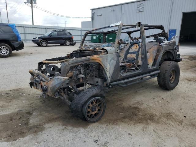 JEEP WRANGLER U 2015 with VIN 1C4HJWDG9FL636594 - Photo from auction