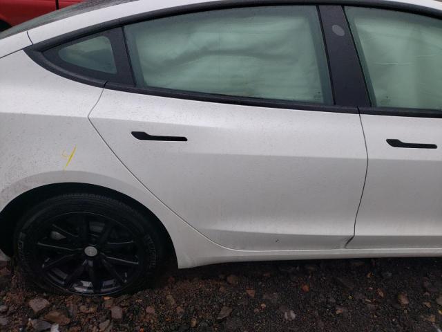 Photo 10 from auction – 2022 TESLA MODEL 3 with VIN 5YJ3E1EB0NF314643