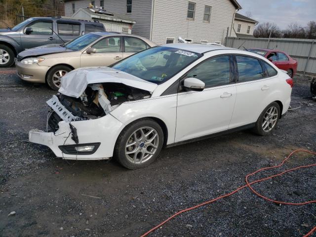 FORD FOCUS SE 2015 with VIN 1FADP3F2XFL321418 - Photo from auction