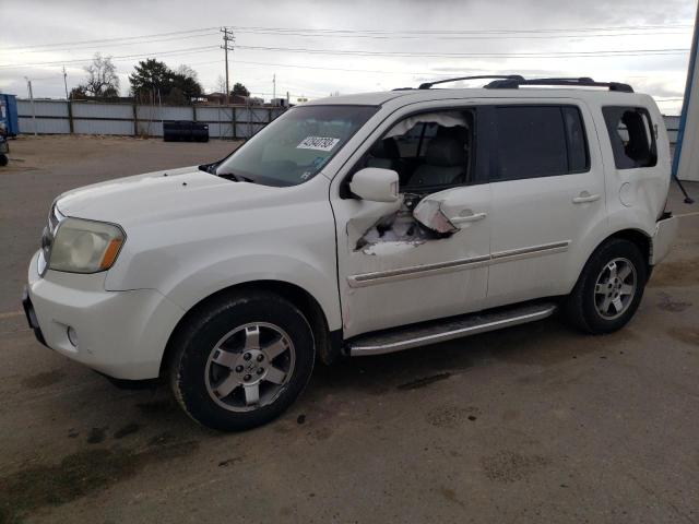 HONDA PILOT TOUR 2011 with VIN 5FNYF4H97BB074953 - Photo from auction