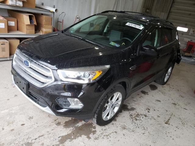 FORD ESCAPE SE 2017 with VIN 1FMCU9G95HUD99451 - Photo from auction