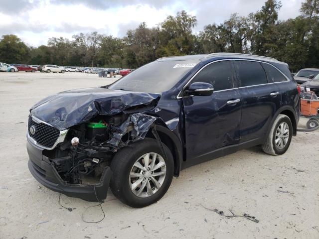 KIA SORENTO LX 2016 with VIN 5XYPG4A35GG170353 - Photo from auction