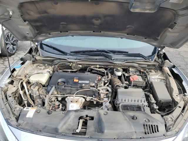 Photo 11 from auction – 2018 HONDA CIVIC EX with VIN 19XFC2F74JE203127
