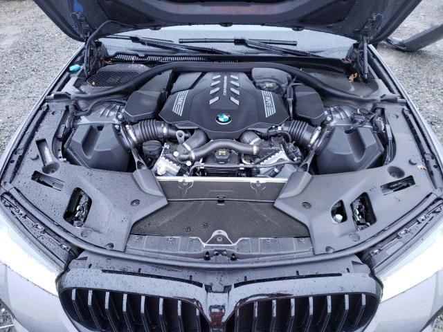 Photo 11 from auction – 2022 BMW M550XI with VIN WBA13BK05NCL01757