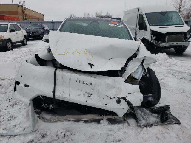 Photo 5 from auction – 2021 TESLA MODEL Y with VIN 5YJYGAEE9MF200326