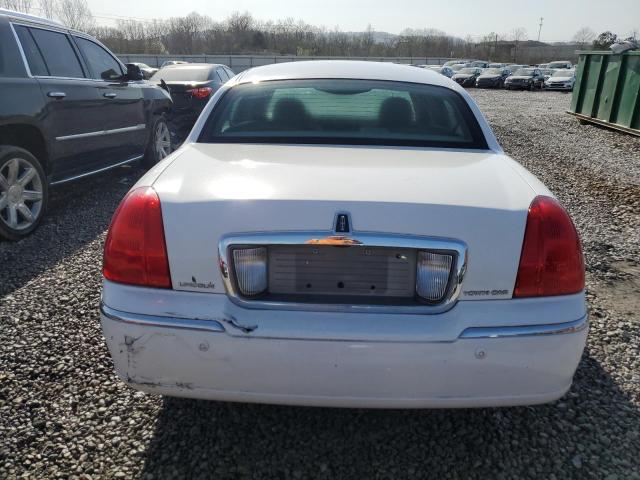 Photo 6 from auction – 2004 LINCOLN TOWN CAR E with VIN 1LNHM81W54Y659770