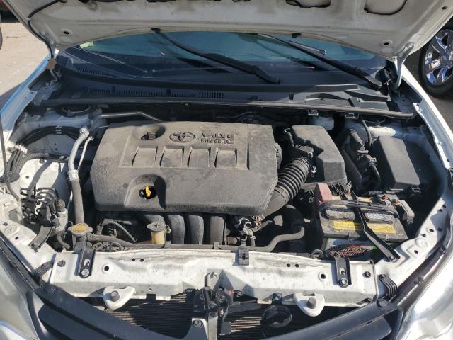 Photo 11 from auction – 2014 TOYOTA COROLLA EC with VIN 5YFBPRHE1EP009327
