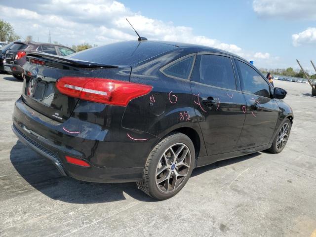 Photo 3 from auction – 2016 FORD FOCUS SE with VIN 1FADP3F28GL342978