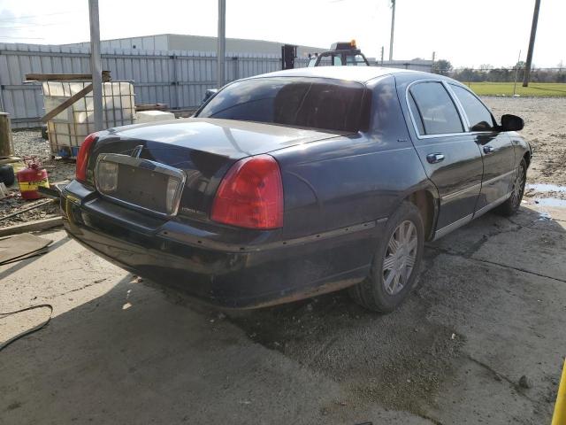 Photo 3 from auction – 2004 LINCOLN TOWN CAR U with VIN 1LNHM83W64Y688952