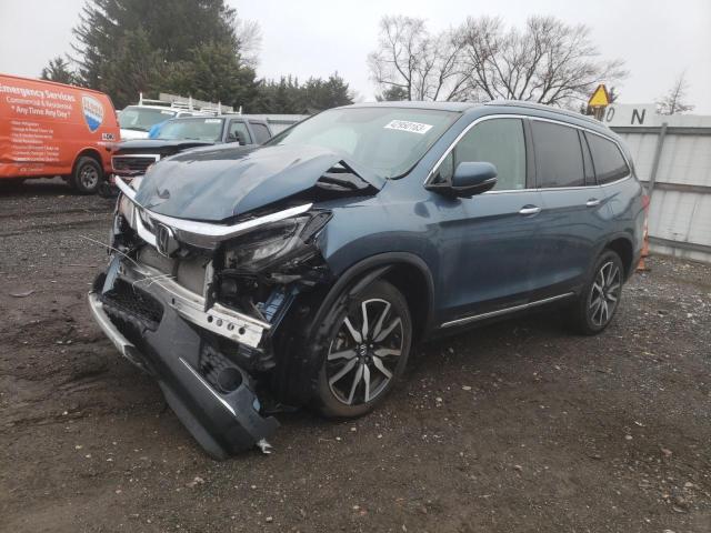 HONDA PILOT TOUR 2020 with VIN 5FNYF6H60LB034930 - Photo from auction