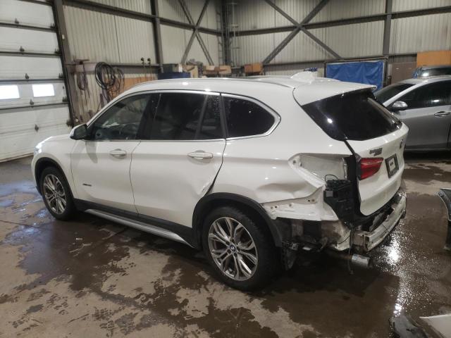 Photo 2 from auction – 2017 BMW X1 XDRIVE2 with VIN WBXHT3C33H5F68720