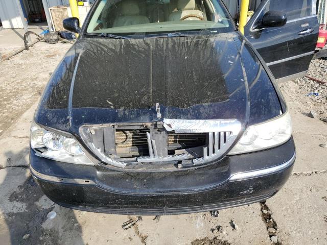 Photo 11 from auction – 2004 LINCOLN TOWN CAR U with VIN 1LNHM83W64Y688952