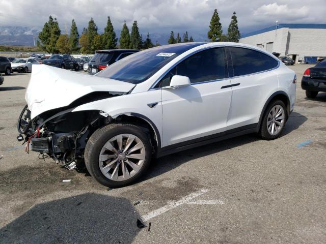 TESLA MODEL X 2020 with VIN 5YJXCDE2XLF304661 - Photo from auction