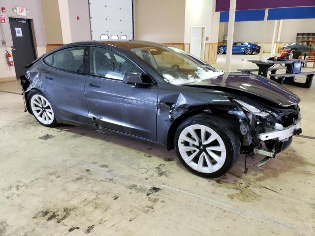 Photo 4 from auction – 2022 TESLA MODEL 3 with VIN 5YJ3E1EA4NF190822