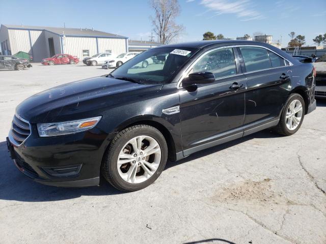 FORD TAURUS SEL 2014 with VIN 1FAHP2E98EG137726 - Photo from auction