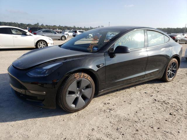 TESLA MODEL 3 2021 with VIN 5YJ3E1EB2MF869477 - Photo from auction