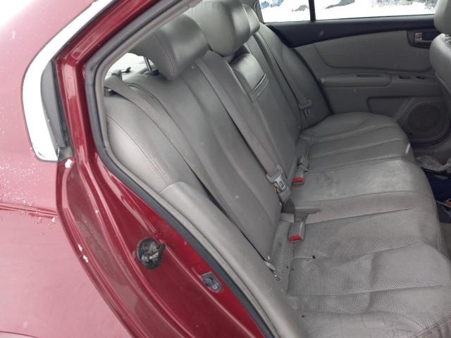 Photo 10 from auction – 2006 KIA OPTIMA LX with VIN KNAGE124865046240