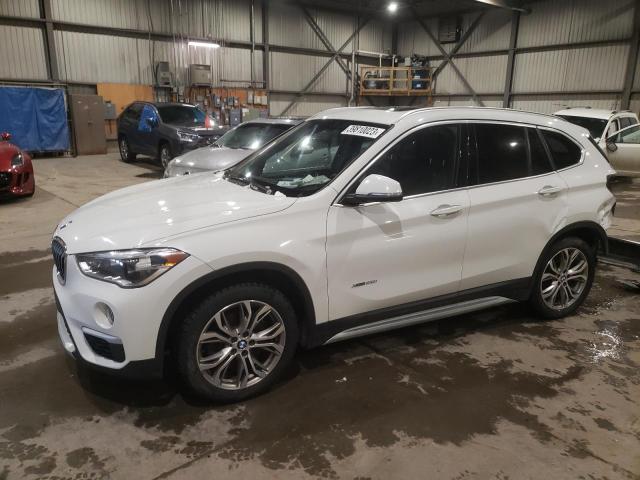 BMW X1 XDRIVE2 2017 with VIN WBXHT3C33H5F68720 - Photo from auction