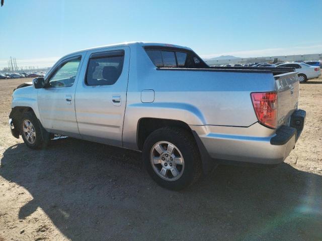 Photo 2 from auction – 2010 HONDA RIDGELINE with VIN 5FPYK1F48AB013358